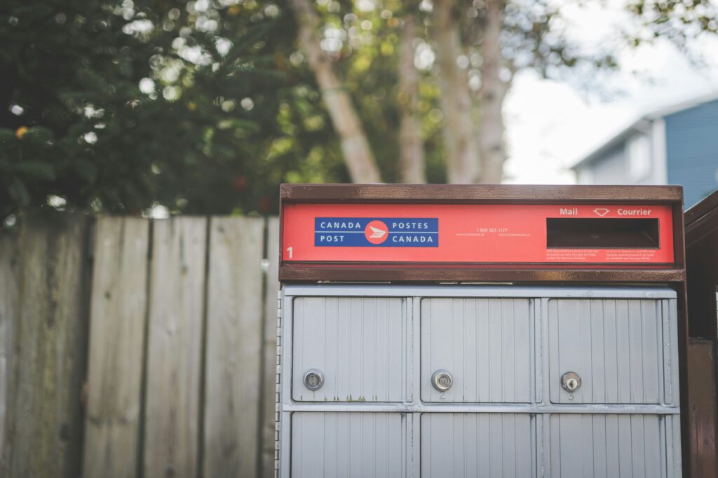 Photo of a Canada Post community mailbox. Delivery will be halted if a Canada Post Strike happens.