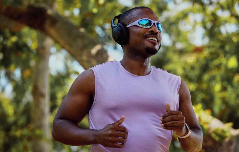Man jogging outdoors with goodr sunglasses